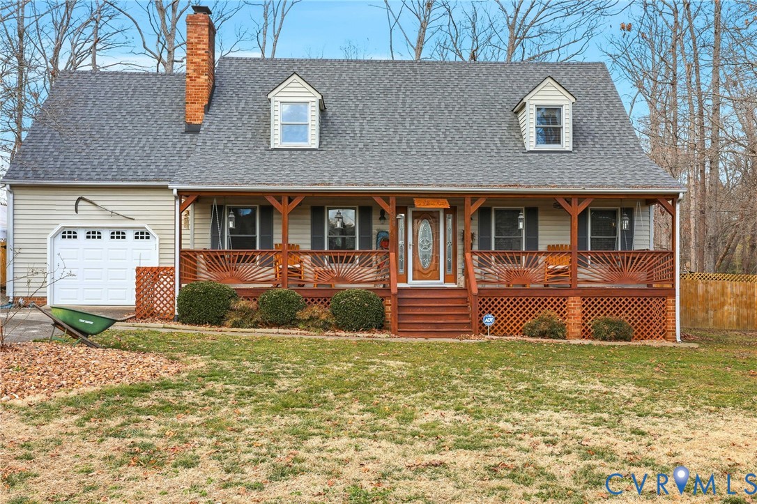 4022 Evelake Road Richmond, VA 23237 - Photo 1 of 35 a front view of a house with garden