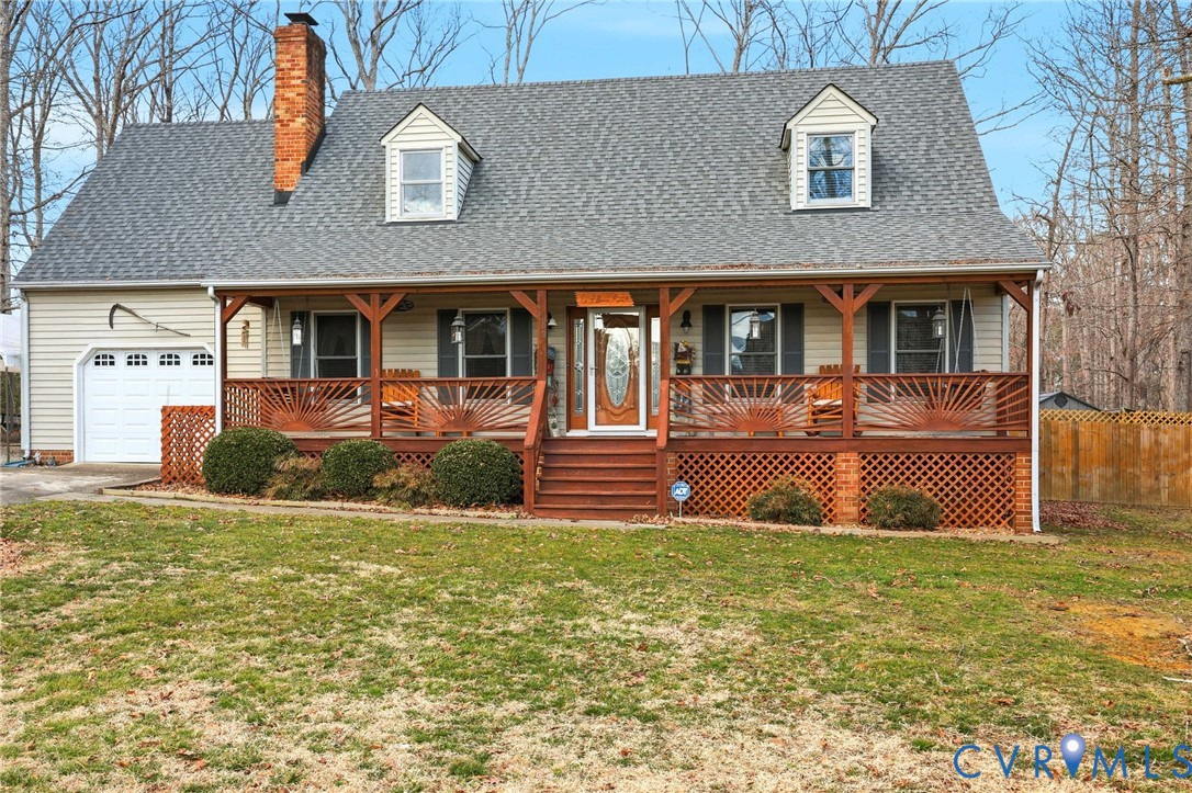 4022 Evelake Road Richmond, VA 23237 - Photo 2 of 35 a front view of a house with large yard