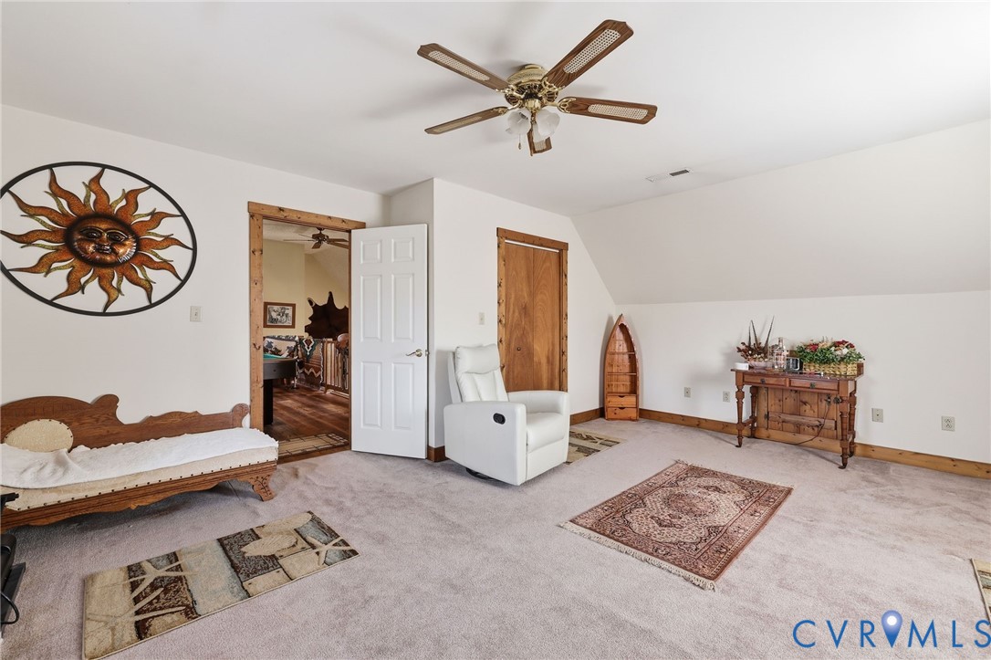 4022 Evelake Road Richmond, VA 23237 - Photo 29 of 35 a living room with furniture and a window