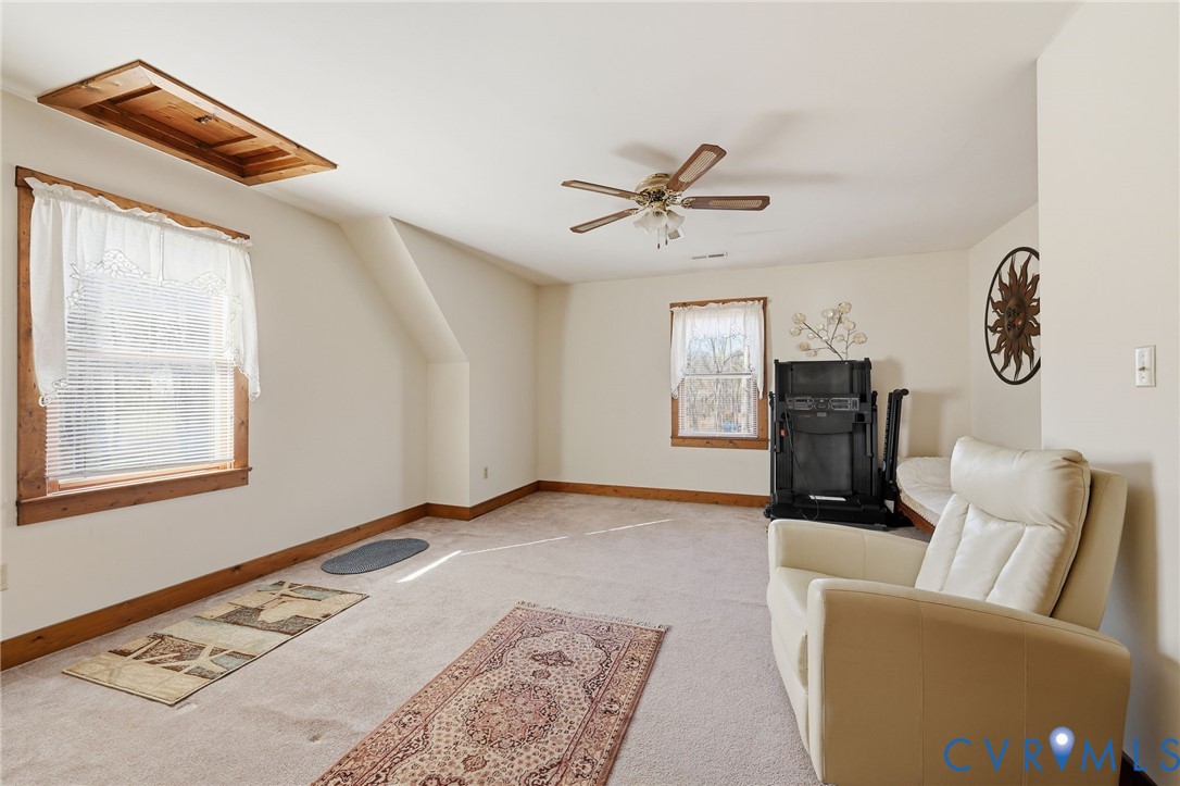 4022 Evelake Road Richmond, VA 23237 - Photo 30 of 35 a living room with furniture and a window