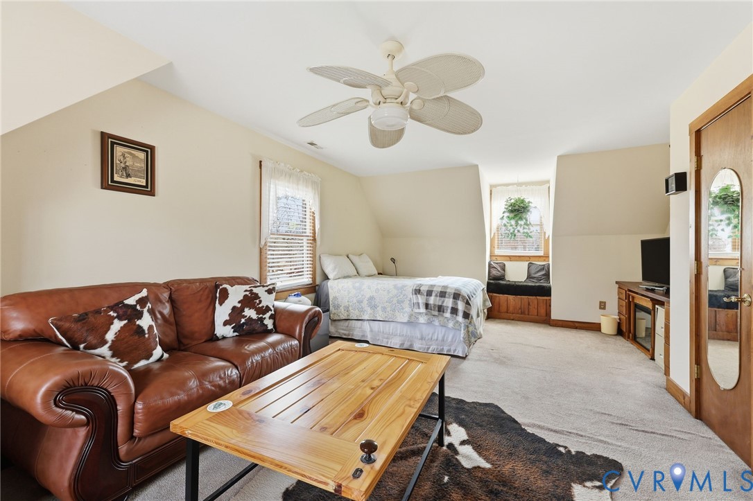 4022 Evelake Road Richmond, VA 23237 - Photo 32 of 35 a living room with furniture and a large window