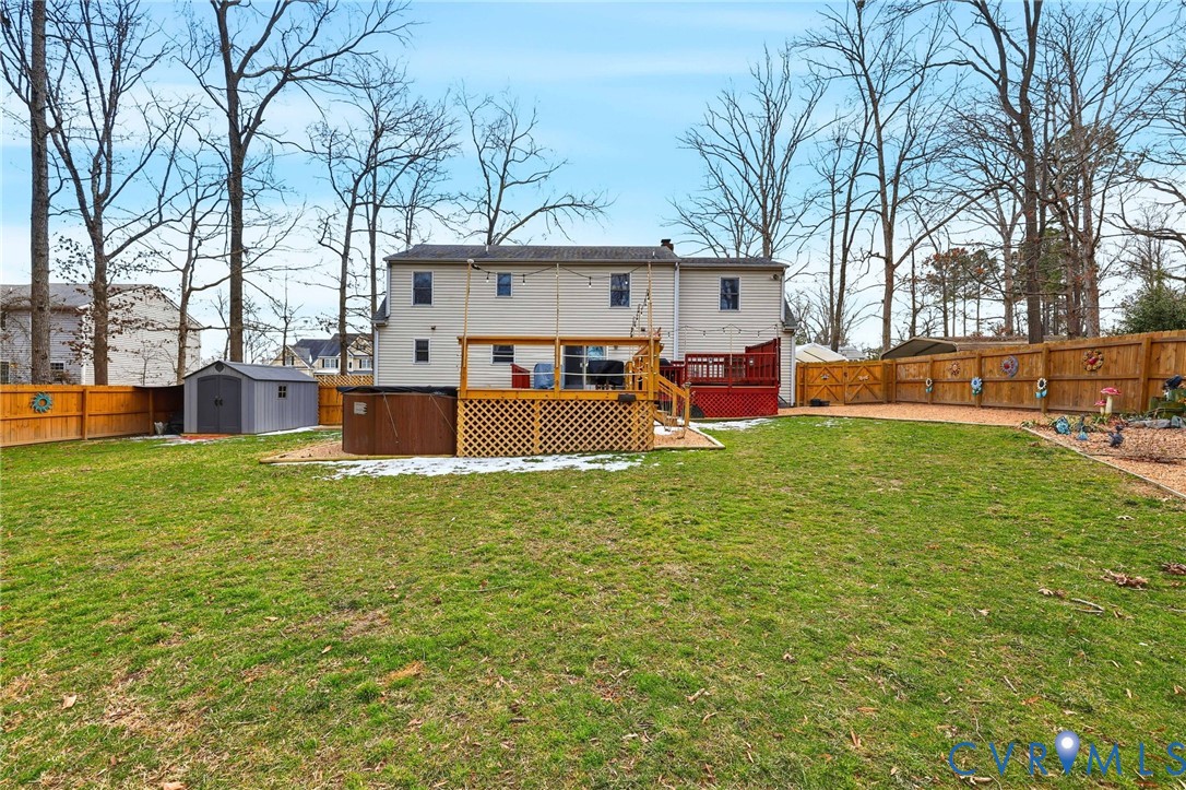 4022 Evelake Road Richmond, VA 23237 - Photo 7 of 35 a view of a house with a backyard