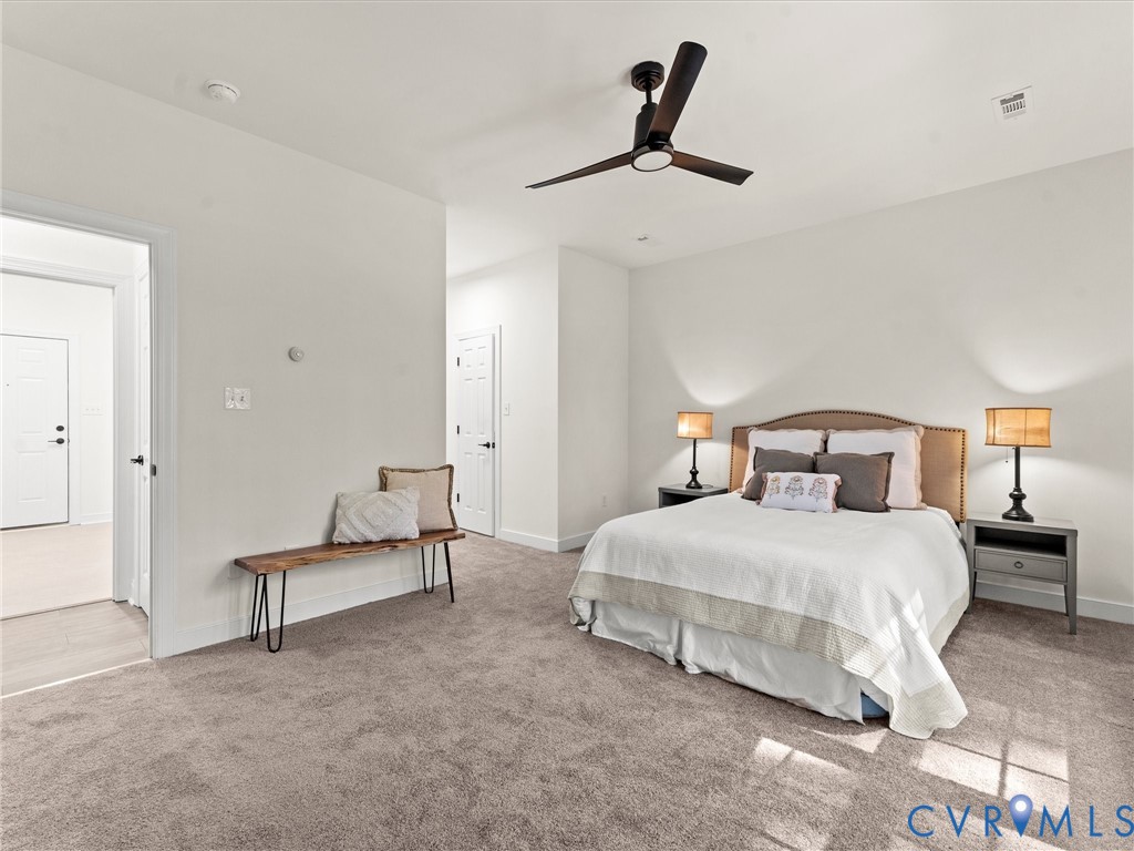 12 Henderson Road New Canton, VA 23123 - Photo 27 of 49 Plush carpet flooring, a ceiling fan with integrat
