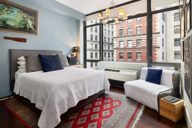 a kitchen with granite countertop a sink stainless steel appliances and cabinets