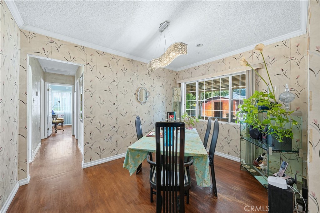 117 Spanner Street Monrovia, CA 91016 - Photo 11 of 33 a view of a dining room with furniture and wooden floor