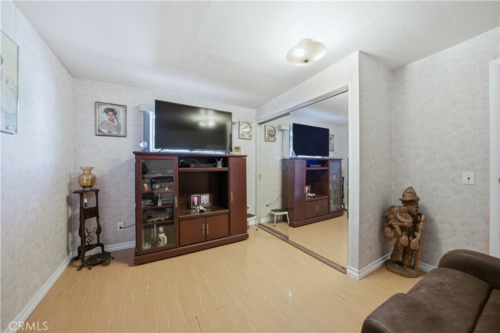 117 Spanner Street Monrovia, CA 91016 - Photo 13 of 33 a living room with furniture and a flat screen tv