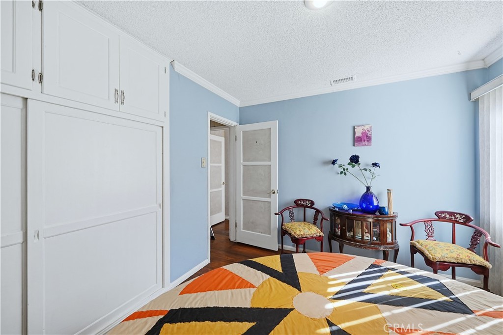 117 Spanner Street Monrovia, CA 91016 - Photo 18 of 33 a living room with furniture and a wooden floor