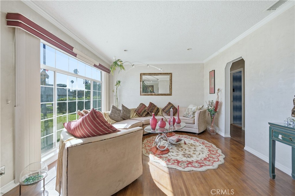 117 Spanner Street Monrovia, CA 91016 - Photo 4 of 33 a living room with furniture and a large window