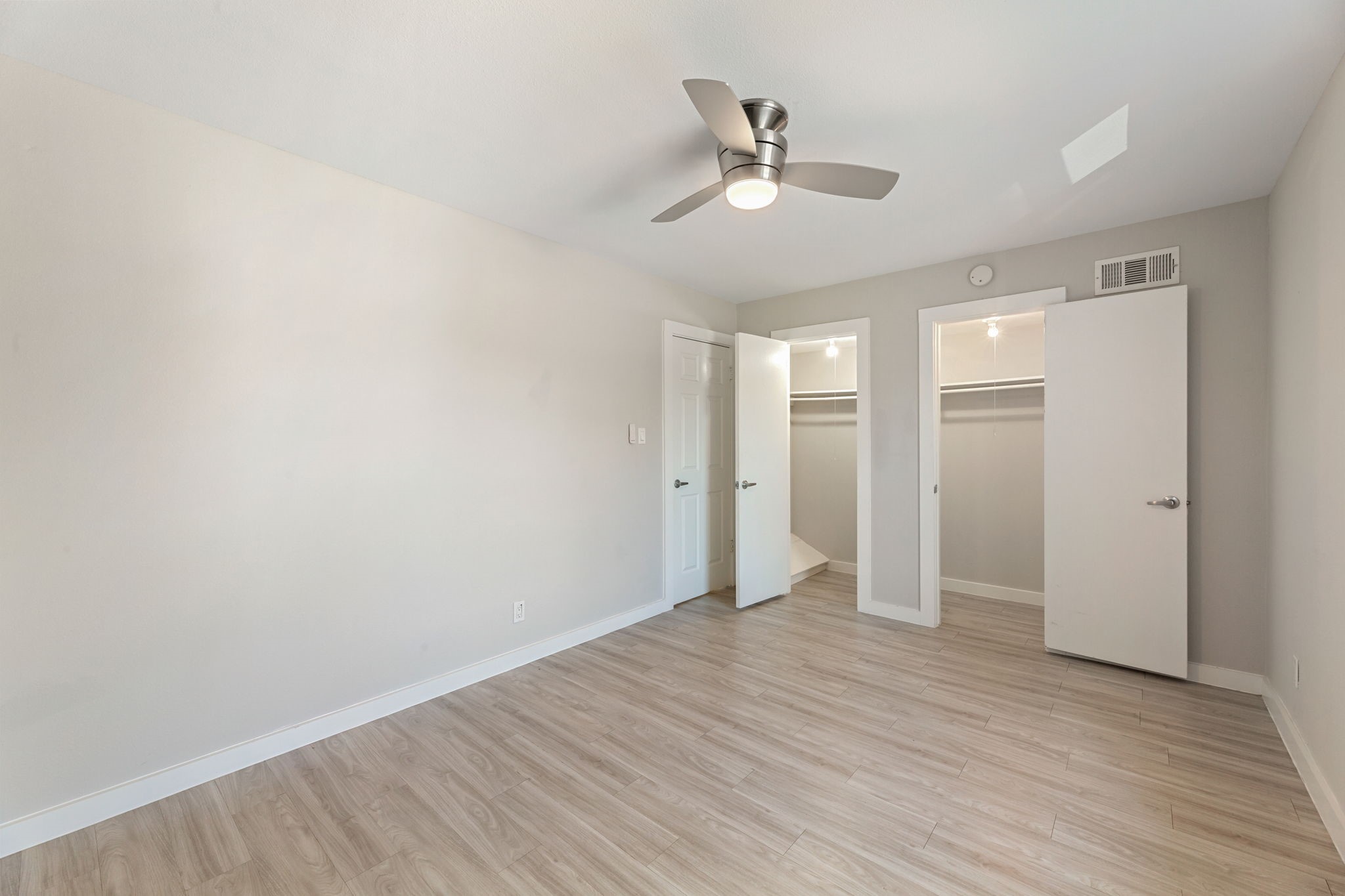 5005 Manor Road, Unit 122 Austin, TX 78723 - Photo 19 of 35 a view of empty room with wooden floor