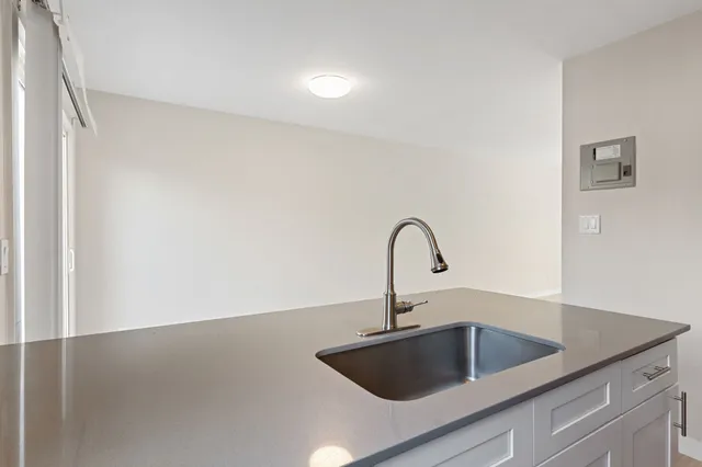 a close view of a sink and tap