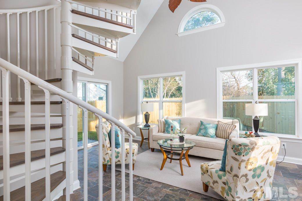 820 Colleton Road Raleigh, NC 27610 - Photo 2 of 25 a living room with furniture and a large window