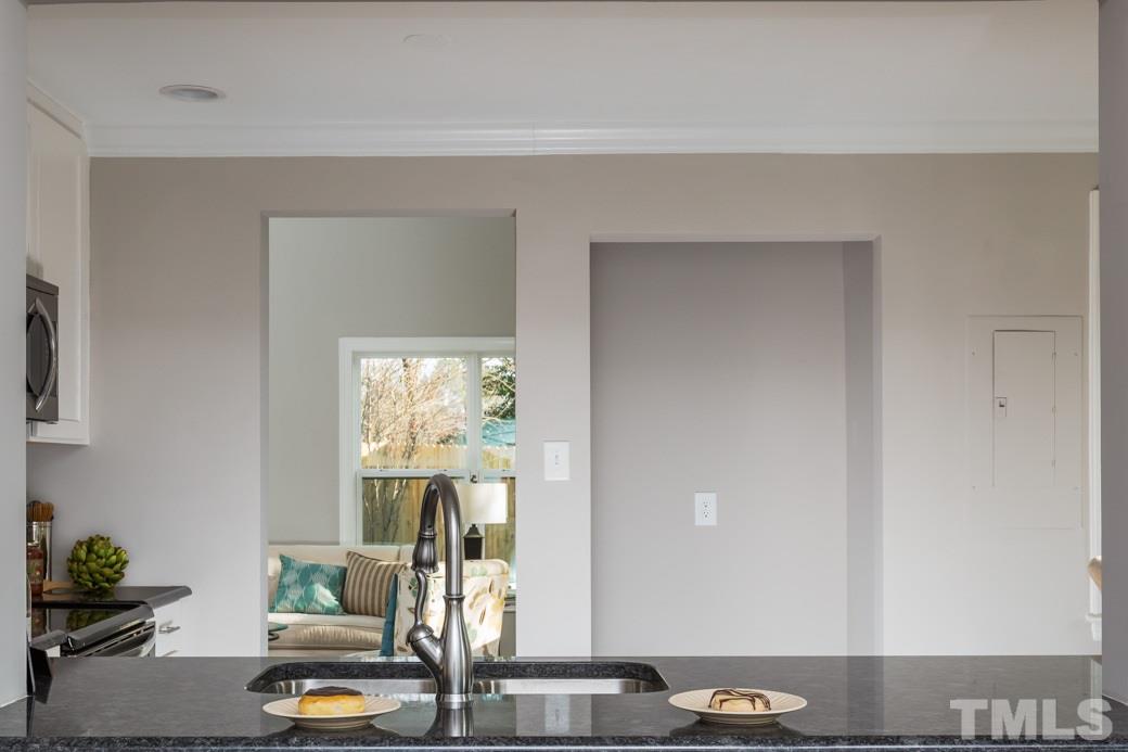 820 Colleton Road Raleigh, NC 27610 - Photo 12 of 25 a living room with furniture and a window
