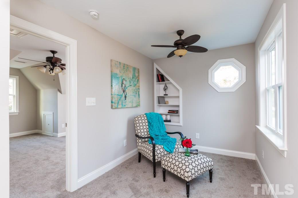 820 Colleton Road Raleigh, NC 27610 - Photo 19 of 25 a living room with furniture and a window