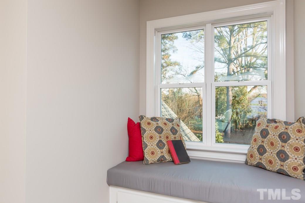 820 Colleton Road Raleigh, NC 27610 - Photo 20 of 25 a living room with furniture and a large window