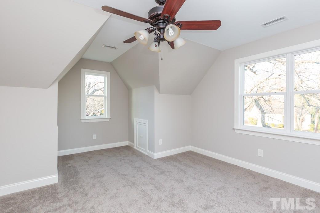 820 Colleton Road Raleigh, NC 27610 - Photo 21 of 25 a view of an empty room with a window