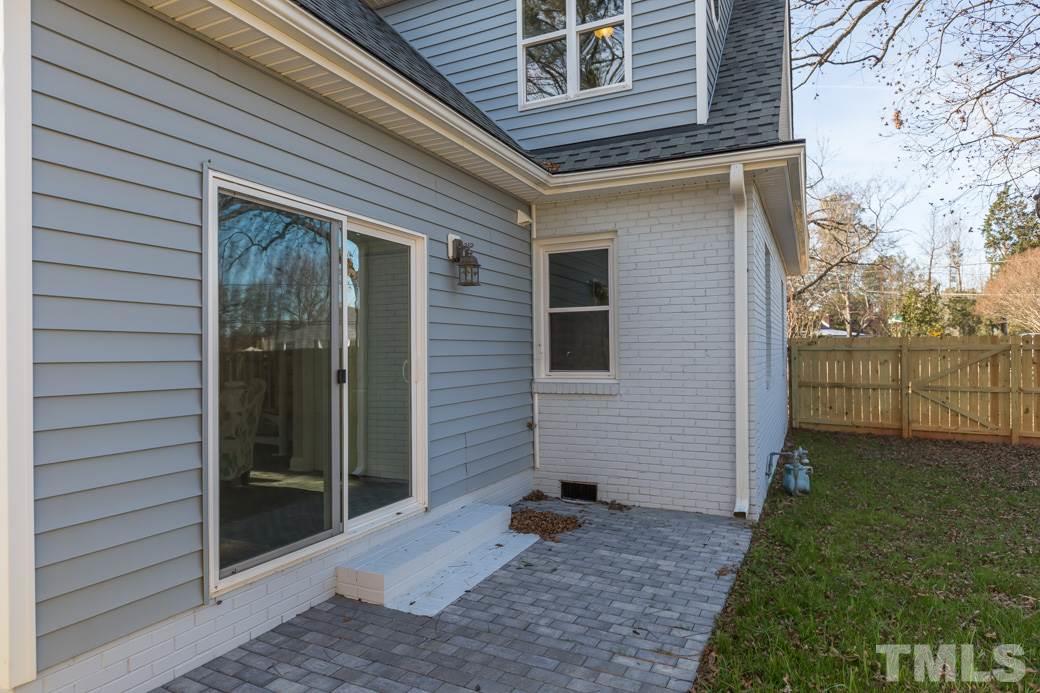 820 Colleton Road Raleigh, NC 27610 - Photo 23 of 25 a backyard of a house with seating space