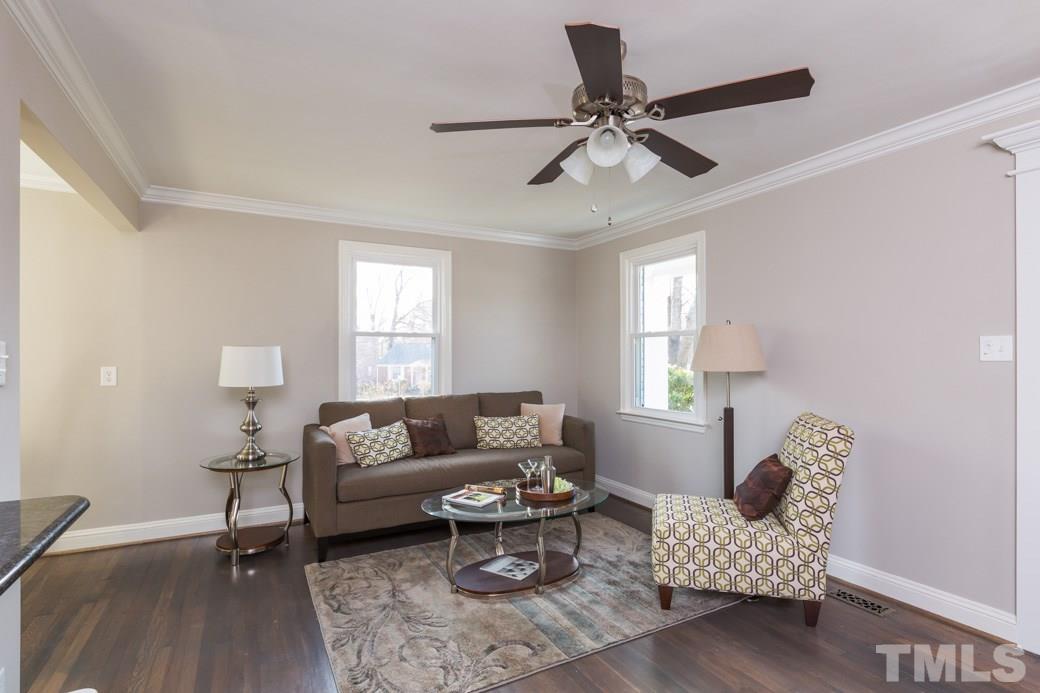 820 Colleton Road Raleigh, NC 27610 - Photo 5 of 25 a living room with furniture and a window