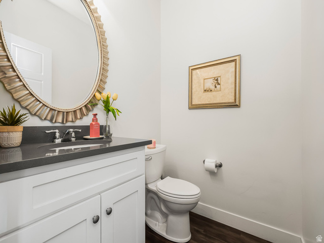 117 Ridge View Drive Elk Ridge, UT 84651 - Photo 12 of 42 Bathroom featuring vanity and dark wood-type flooring