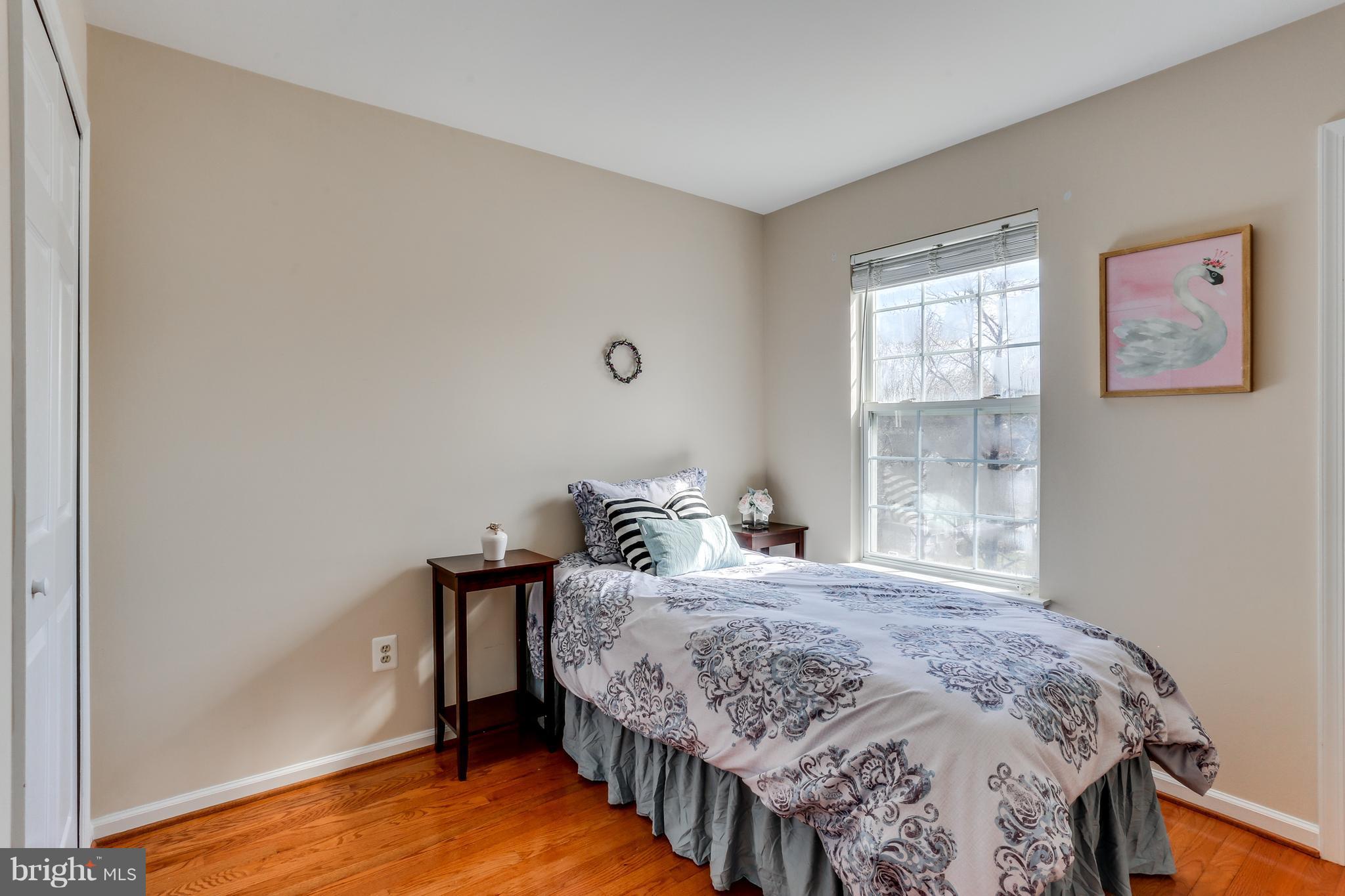 6141 Good Hunters Ride Columbia, MD 21045 - Photo 20 of 28 a bedroom with a bed and a window
