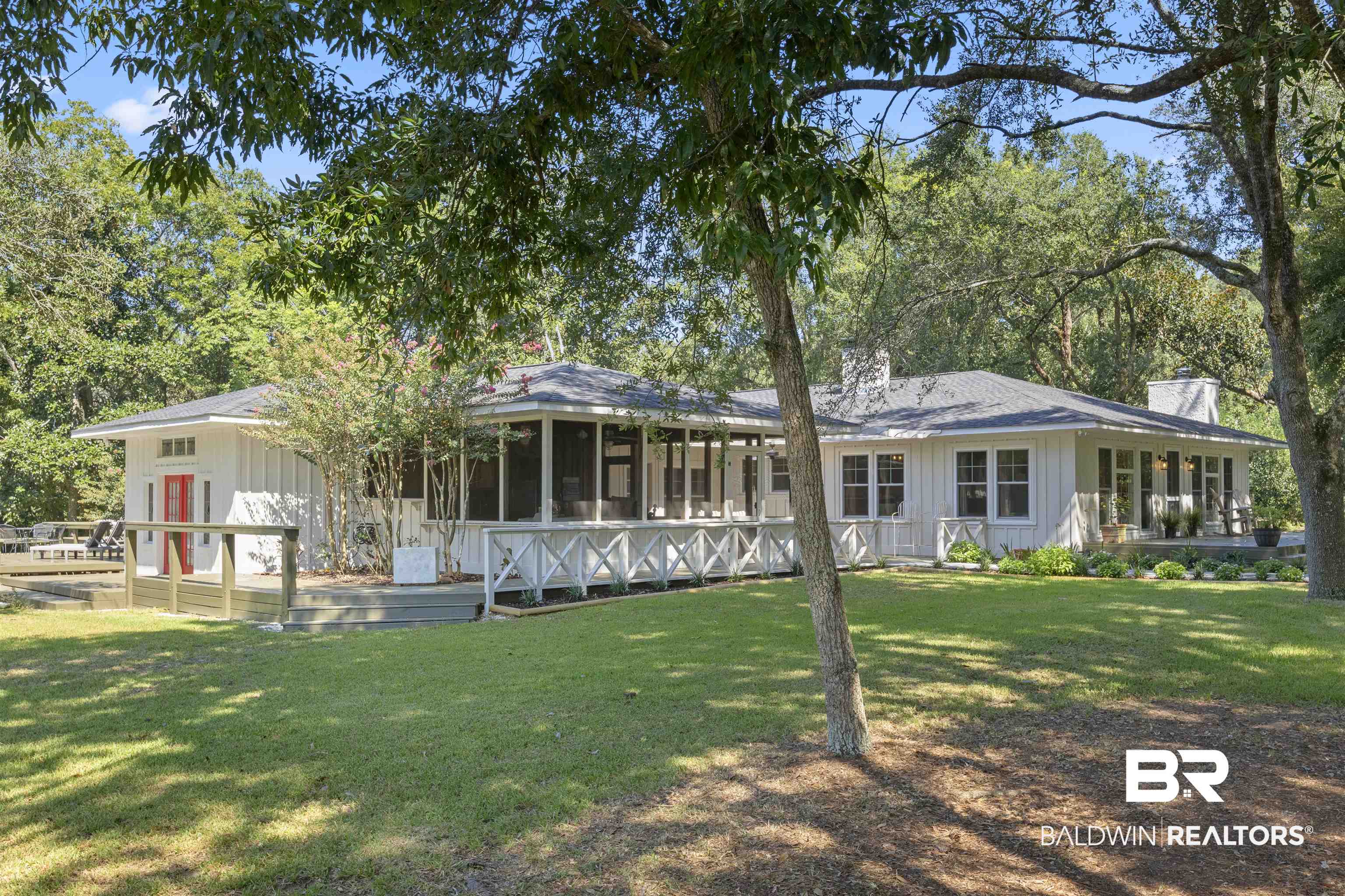 15100 Vasko Road Silverhill, AL 36576 - Photo 35 of 51 Back of property featuring a sunroom and a yard