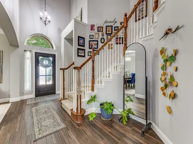 a view of entryway with wooden floor