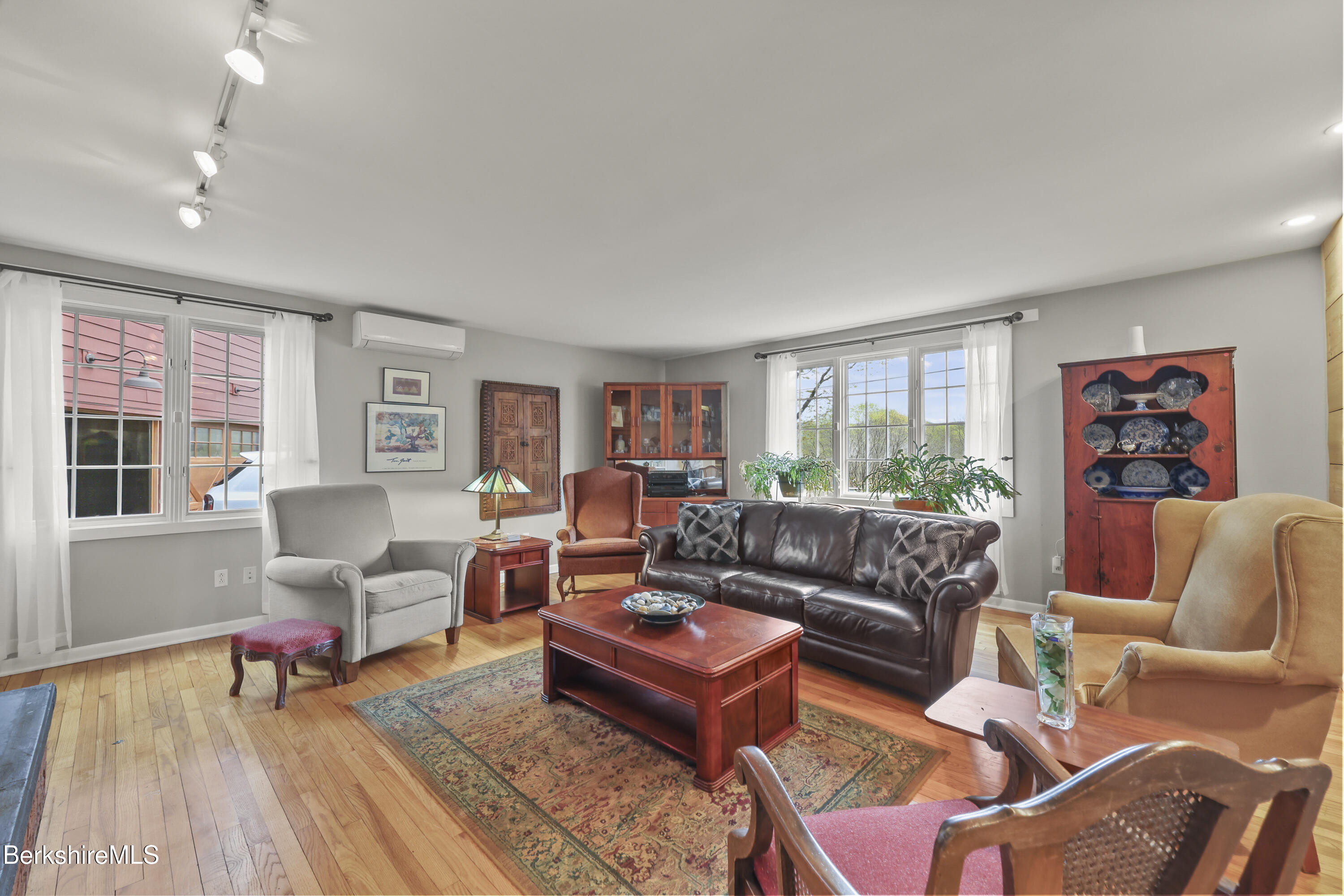 167 Bailey Road Lanesborough, MA 01237 - Photo 20 of 71 a living room with furniture and a wooden floor