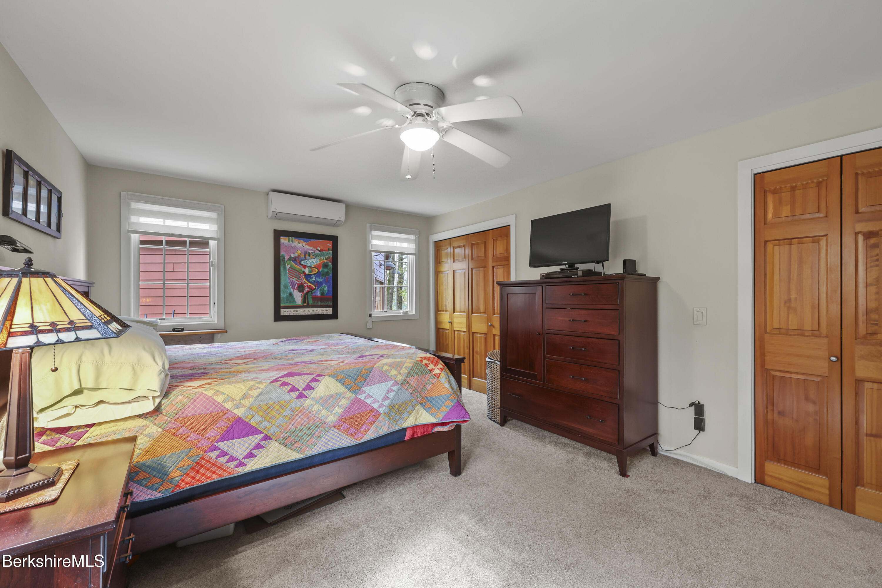 167 Bailey Road Lanesborough, MA 01237 - Photo 27 of 71 a bedroom with a bed and wooden floor