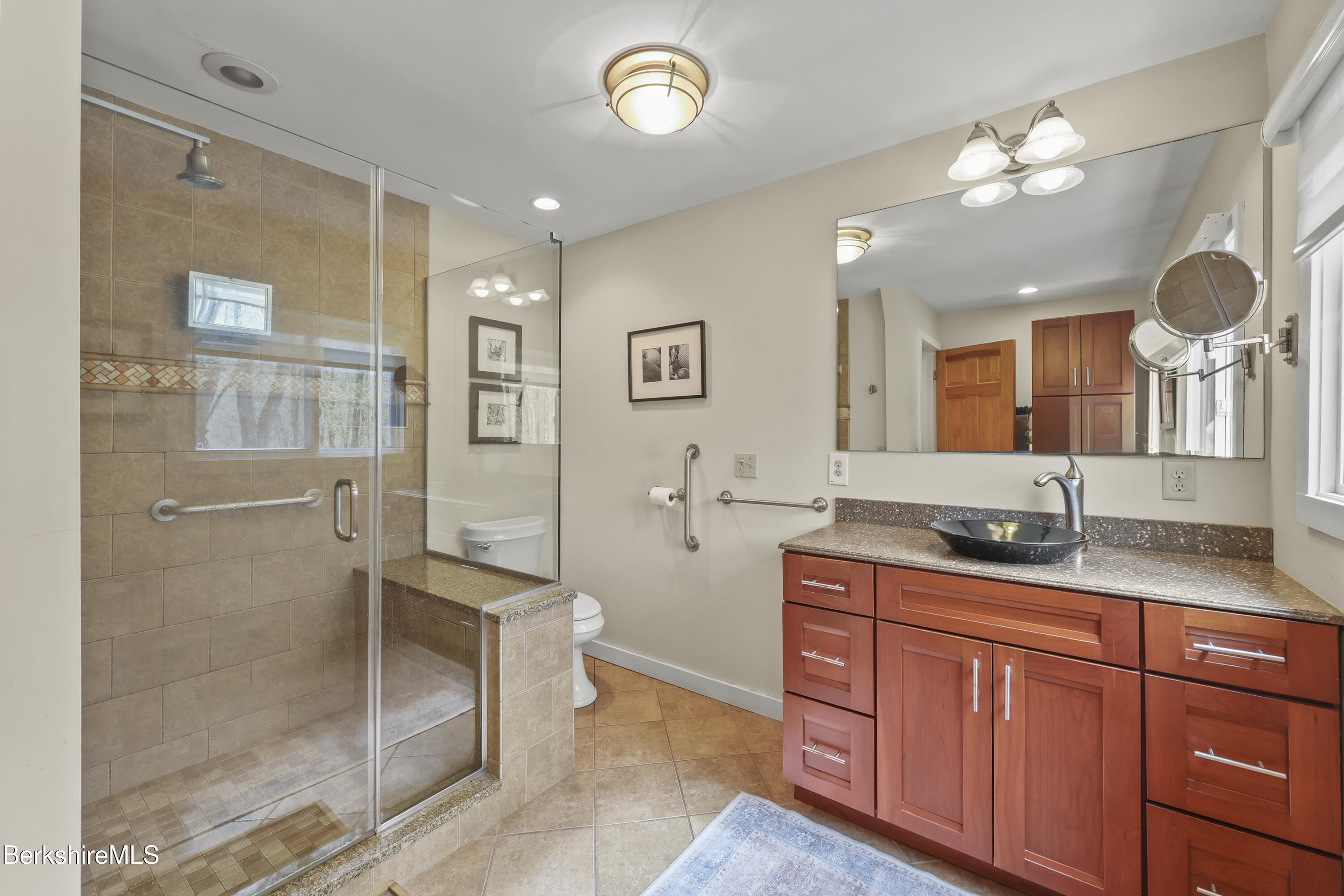 167 Bailey Road Lanesborough, MA 01237 - Photo 29 of 71 a spacious bathroom with a granite countertop sink a mirror and a shower