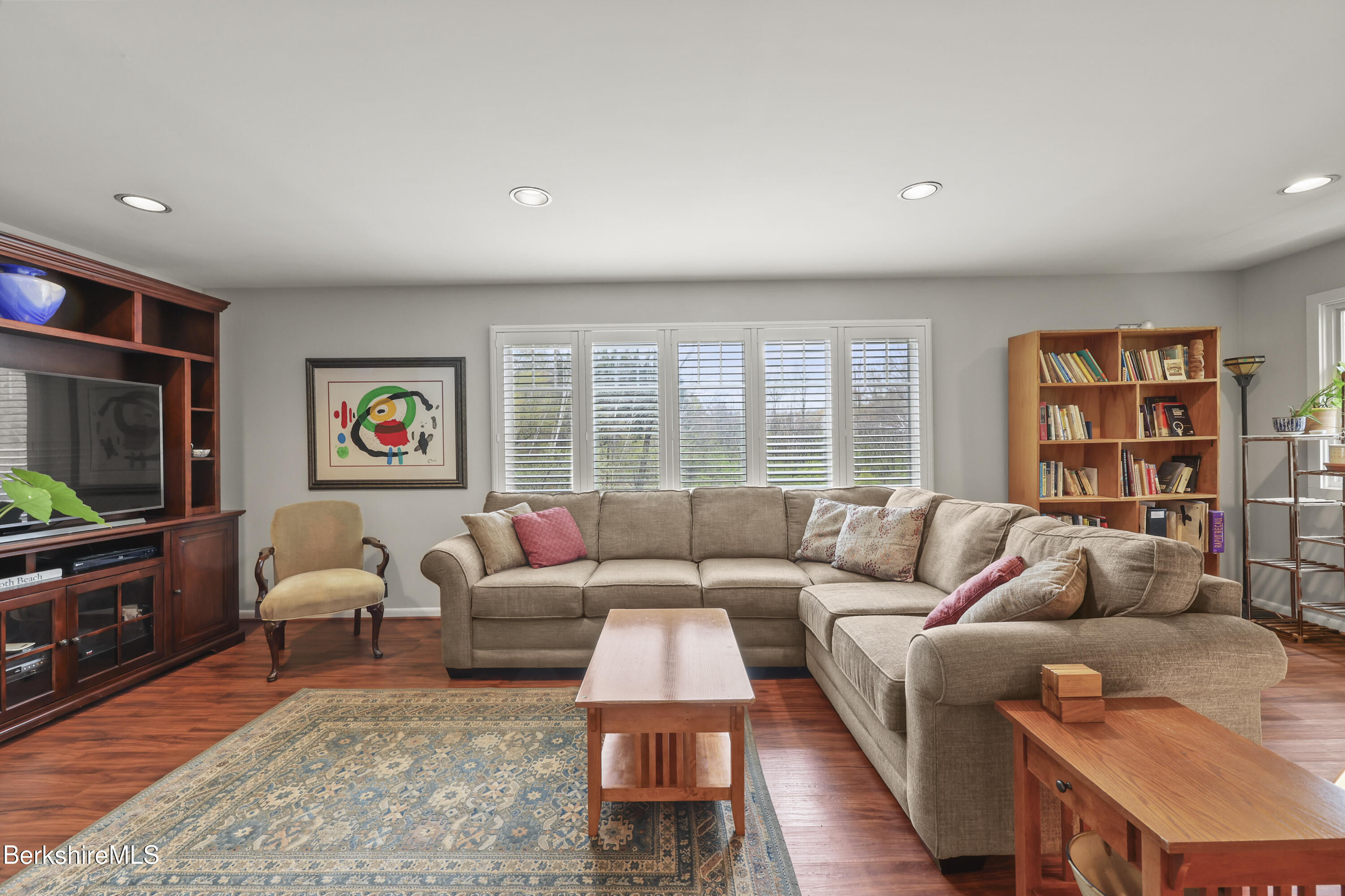 167 Bailey Road Lanesborough, MA 01237 - Photo 31 of 71 a living room with furniture and a flat screen tv