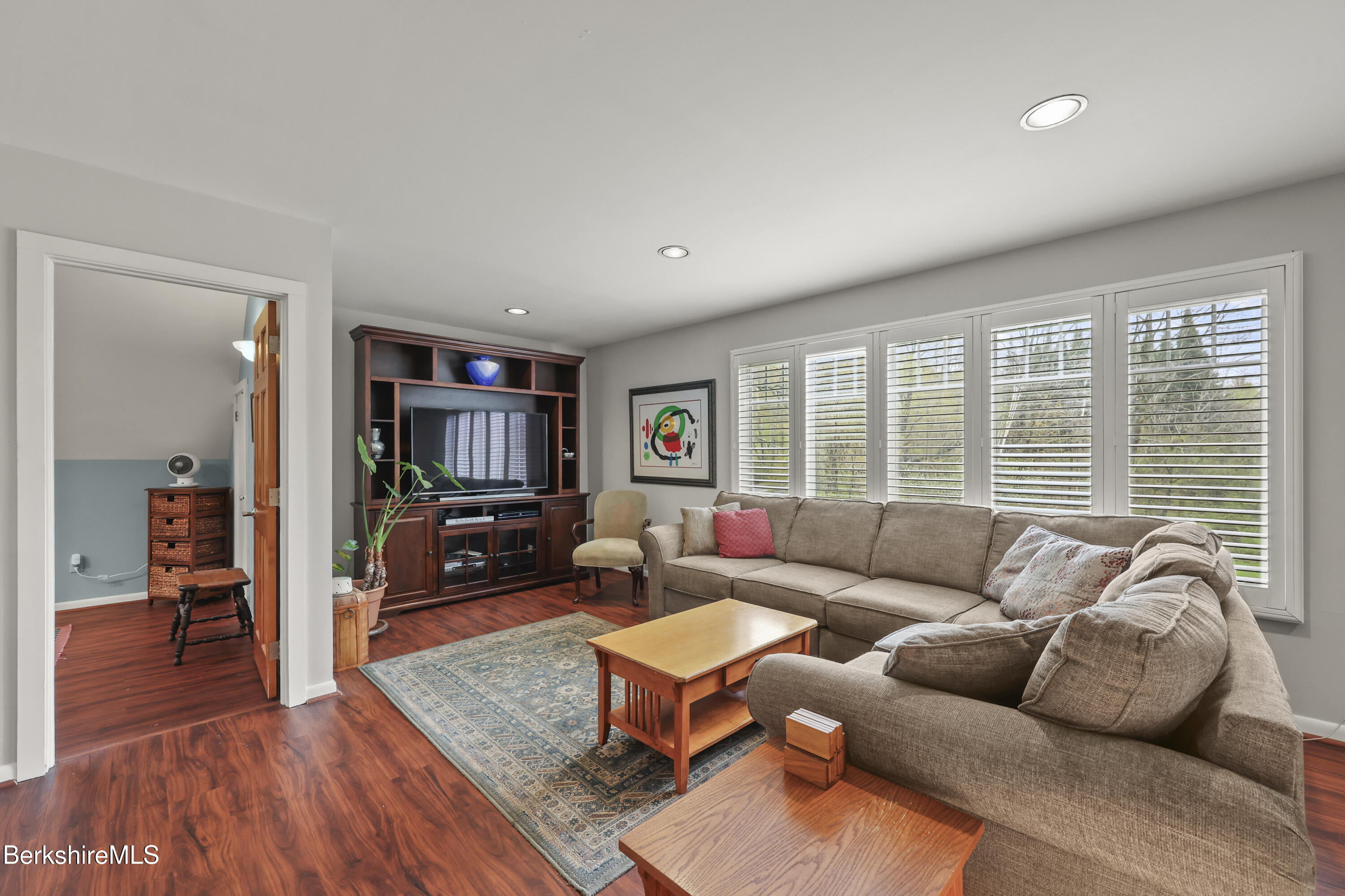 167 Bailey Road Lanesborough, MA 01237 - Photo 32 of 71 a living room with furniture and a flat screen tv