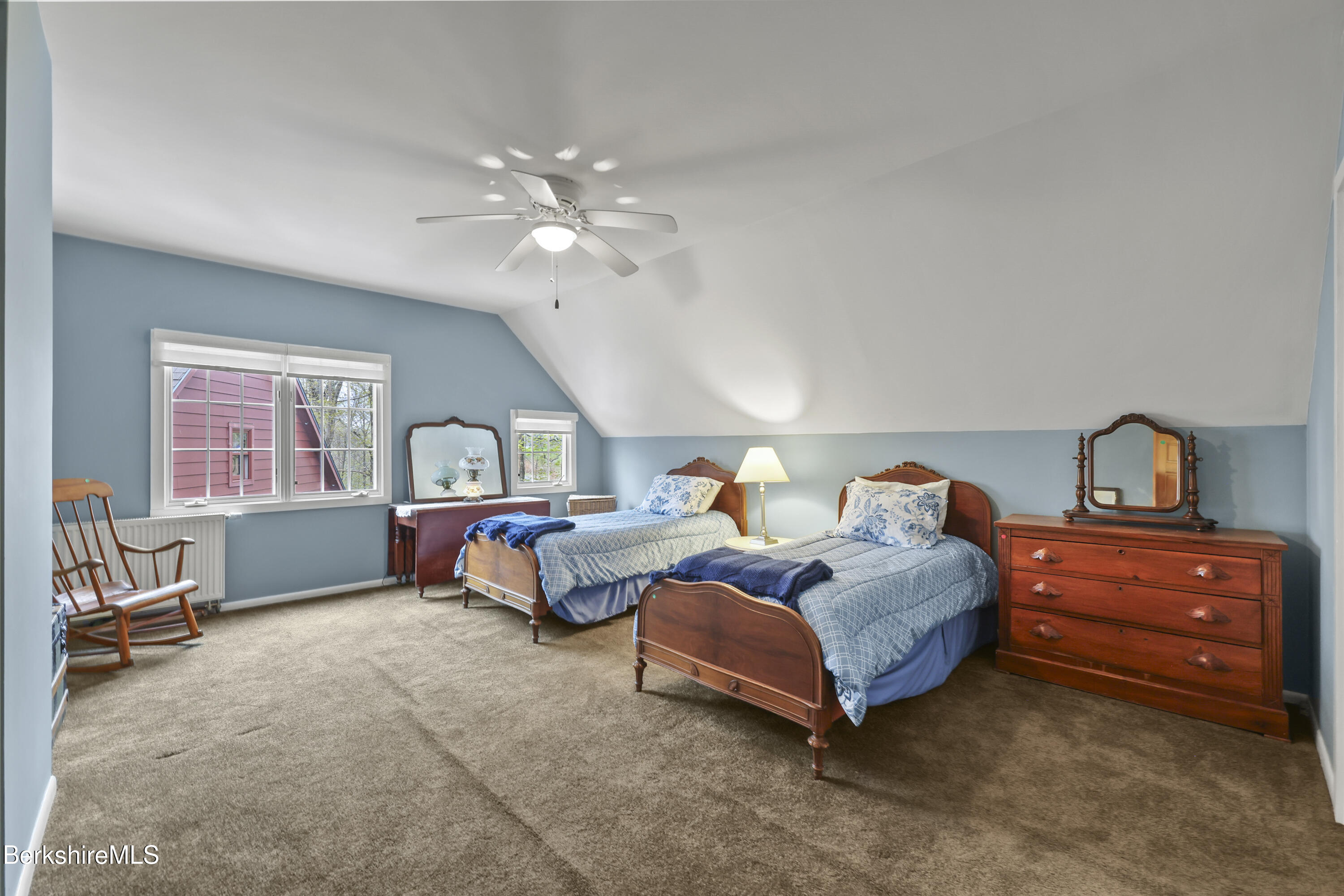 167 Bailey Road Lanesborough, MA 01237 - Photo 37 of 71 a spacious bedroom with two beds and a chandelier