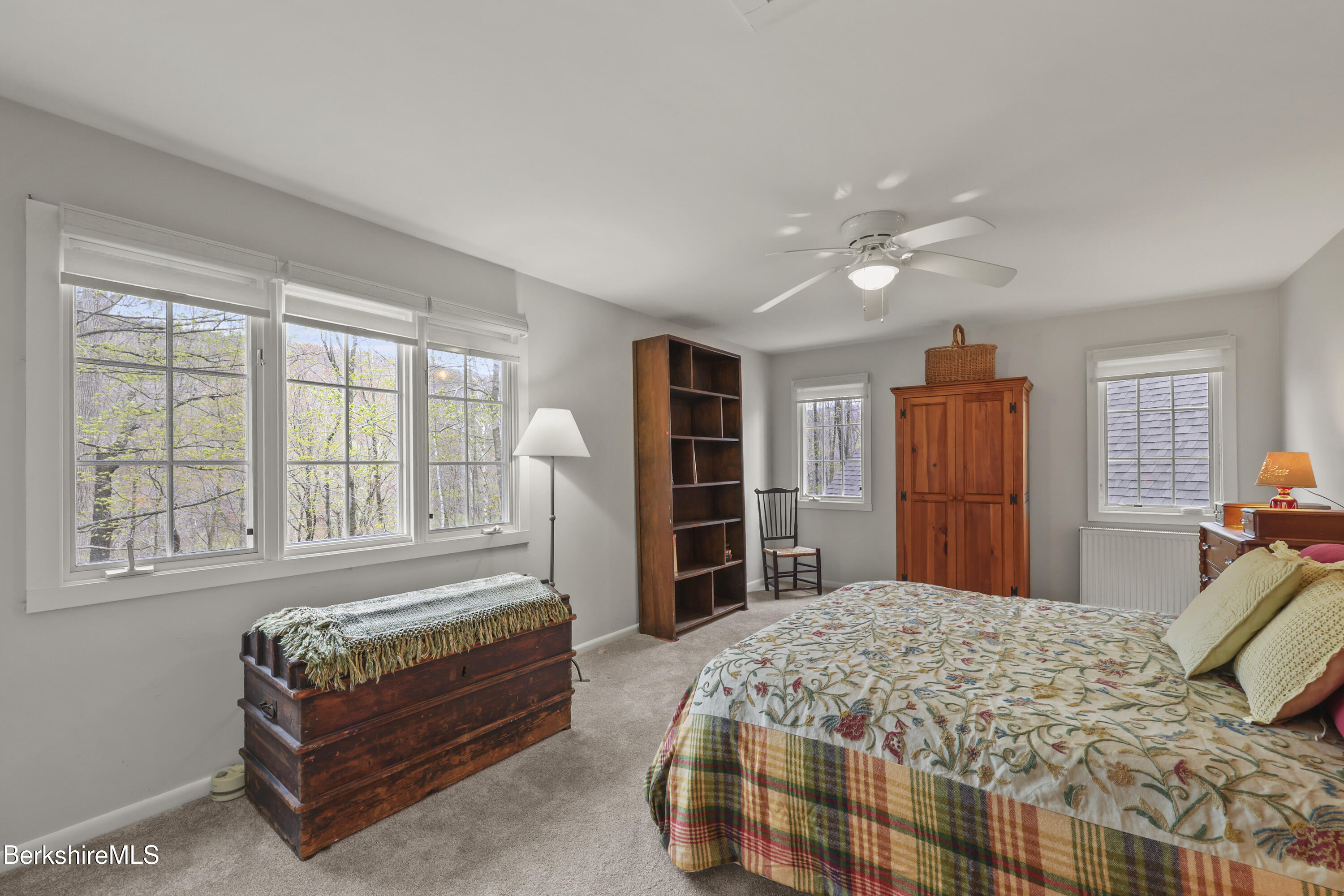 167 Bailey Road Lanesborough, MA 01237 - Photo 39 of 71 a bedroom with a bed a dresser and a large window