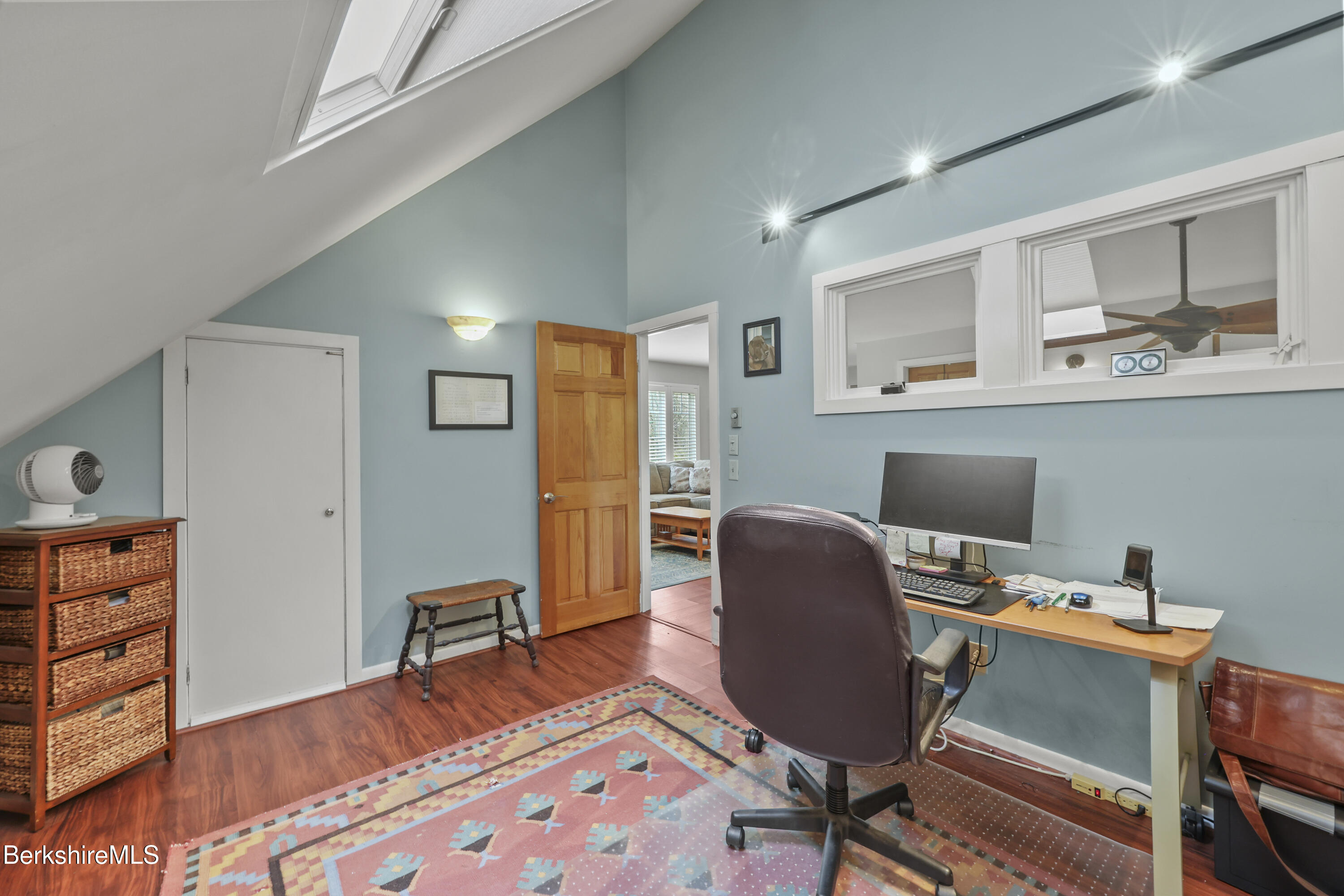 167 Bailey Road Lanesborough, MA 01237 - Photo 46 of 71 a workspace with furniture and wooden floor