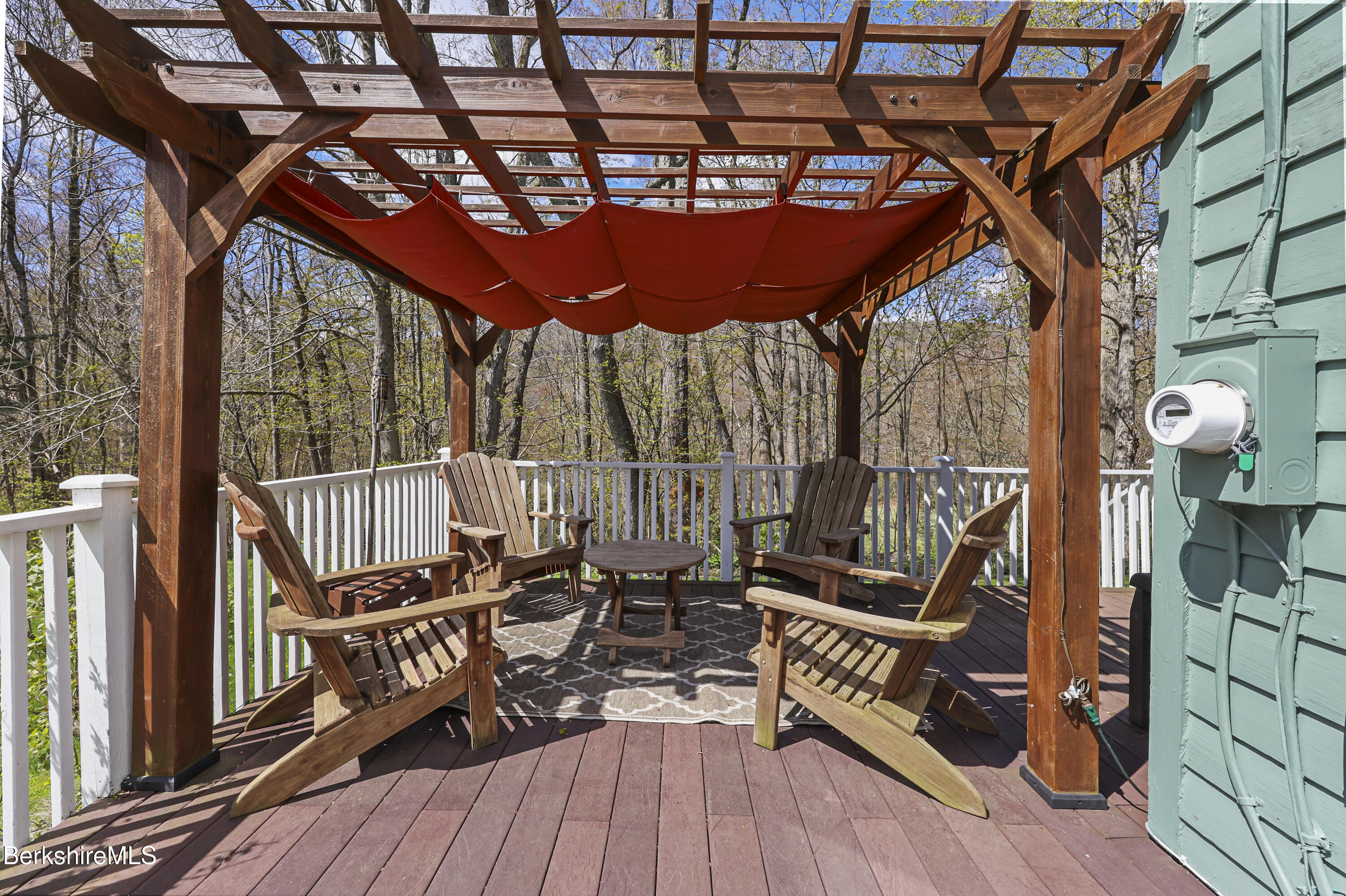167 Bailey Road Lanesborough, MA 01237 - Photo 49 of 71 a view of chairs in wooden deck