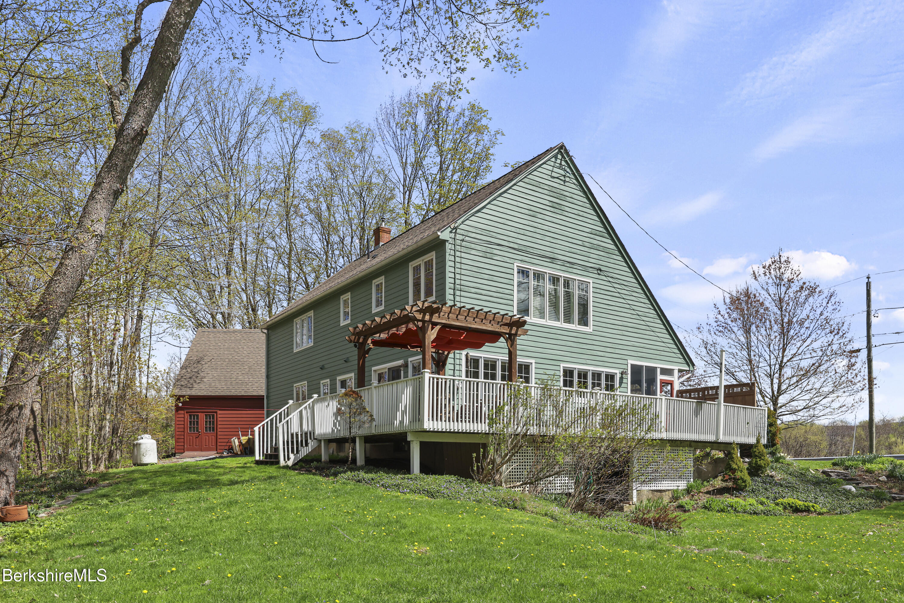 167 Bailey Road Lanesborough, MA 01237 - Photo 54 of 71 a front view of a house with a garden