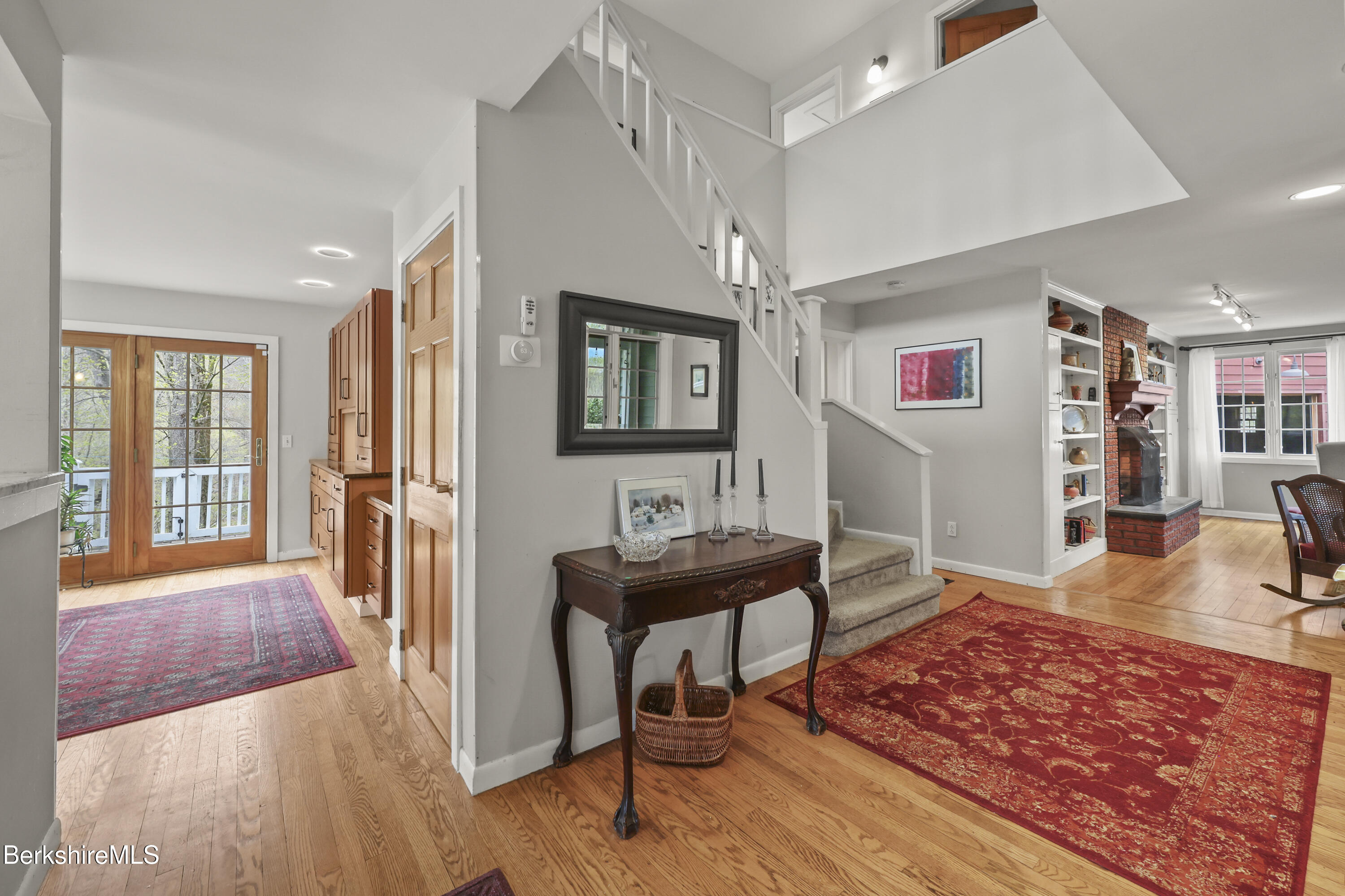 167 Bailey Road Lanesborough, MA 01237 - Photo 6 of 71 a view of a livingroom with furniture wooden floor and windows