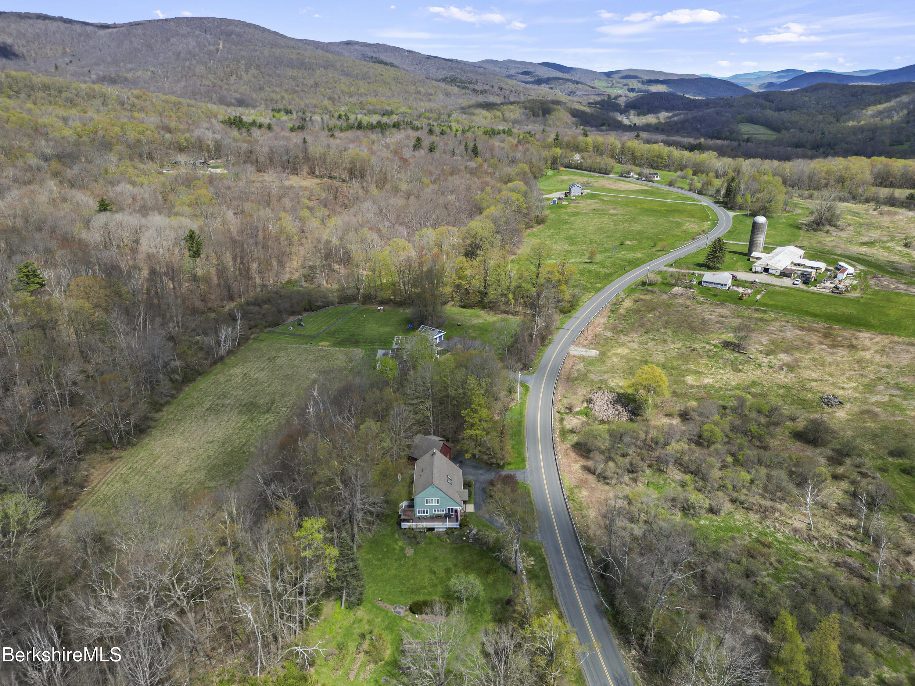 167 Bailey Road Lanesborough, MA 01237 - Photo 69 of 71 a view of a lush green hillside and houses