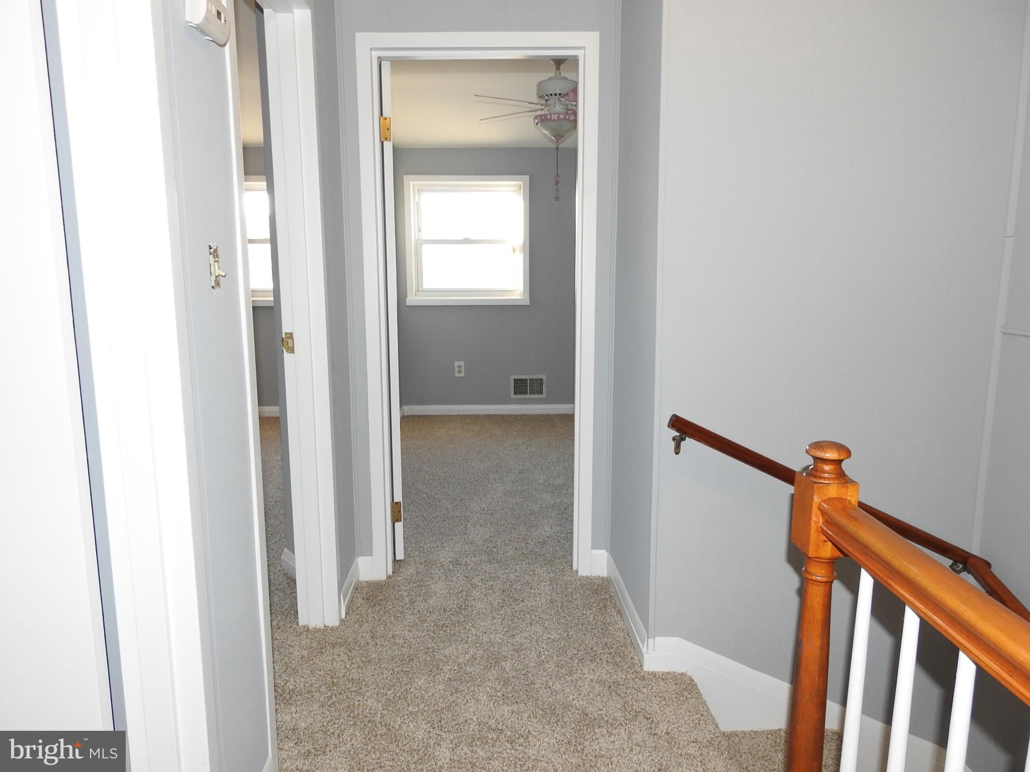 7828 Charlesmont Road Baltimore, MD 21222 - Photo 11 of 22 a view of a hallway with a closet