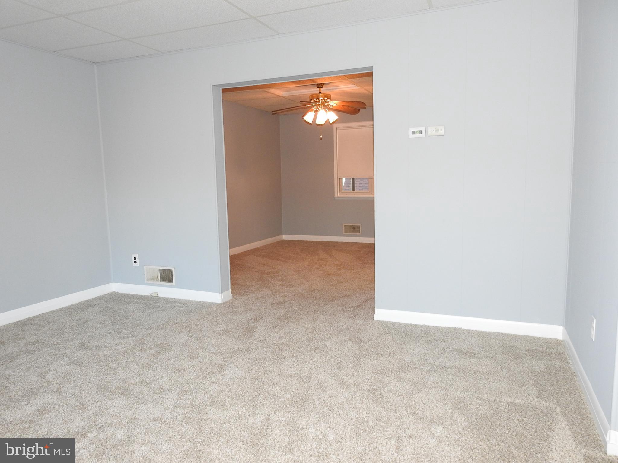7828 Charlesmont Road Baltimore, MD 21222 - Photo 15 of 22 a view of an empty room