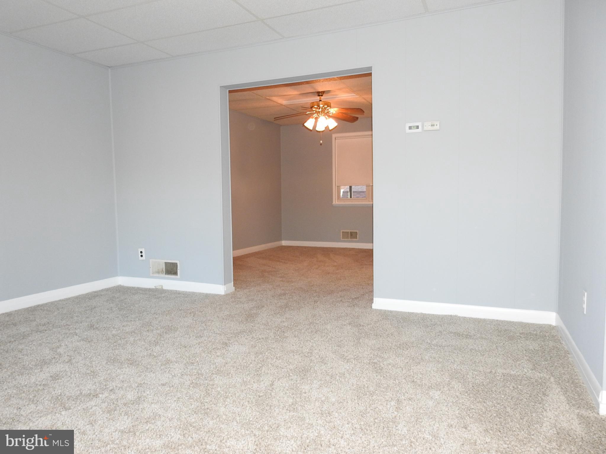 7828 Charlesmont Road Baltimore, MD 21222 - Photo 4 of 22 a view of an empty room