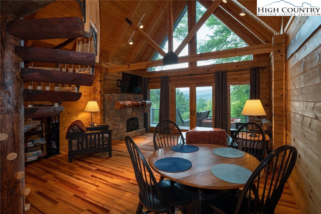 1082 Fox Cove Road Ferguson, NC 28624 - Photo 6 of 22 a view of a dining room with furniture window and outside view