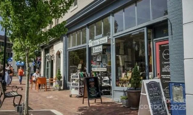 a view of street with sitting area
