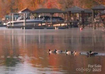 a view of swimming pool with outdoor seating