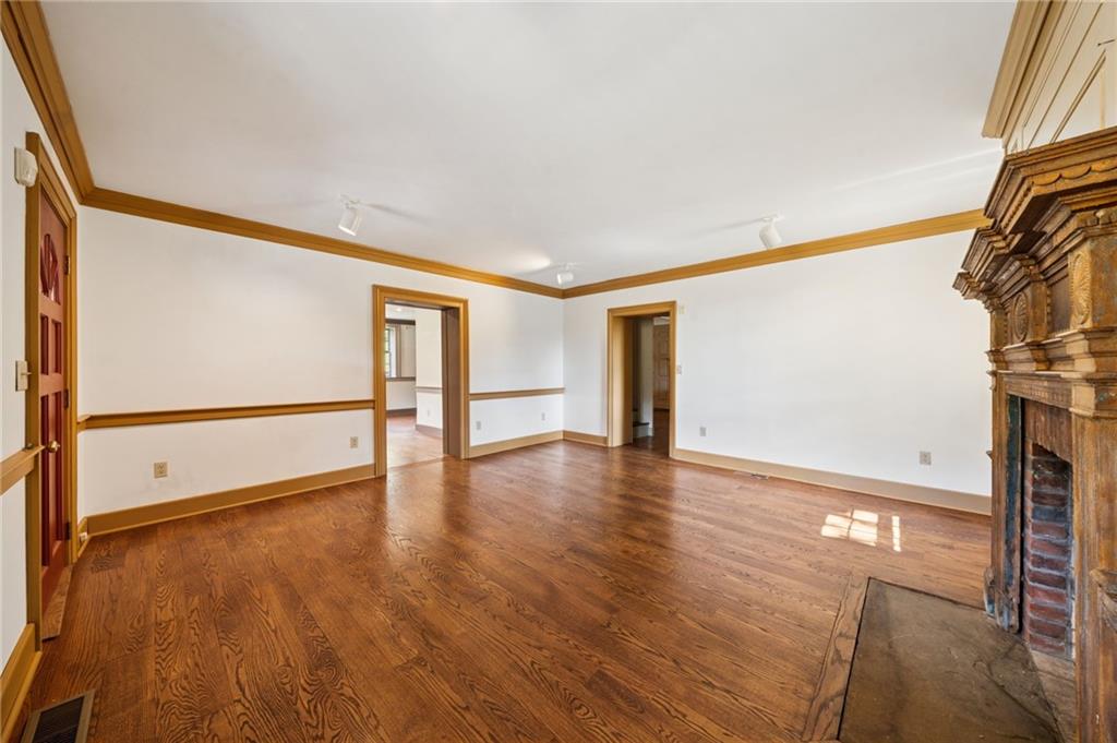 284 Eaton Run Road Jefferson, PA 15344 - Photo 10 of 41 a view of an empty room with wooden floor and a window