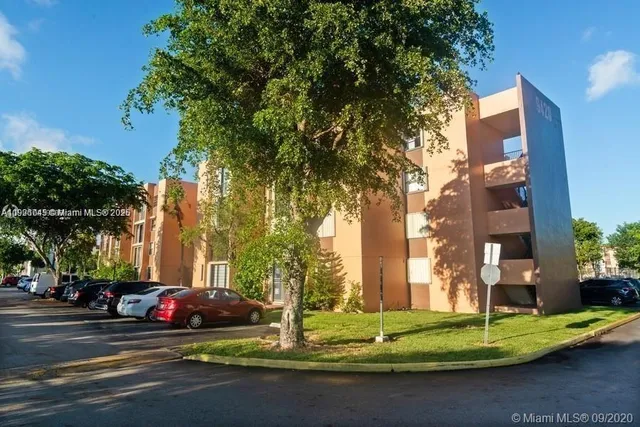 a view of street with parked cars