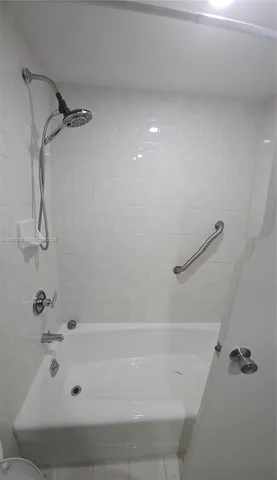a bathroom with a bathtub