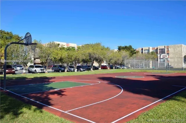 a view of an outdoor space and tennis court