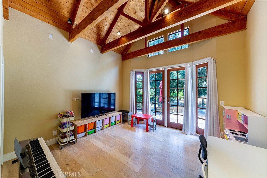 15601 Saddleback Road Canyon Country, CA 91387 - Photo 16 of 55 a room with furniture and a flat screen tv