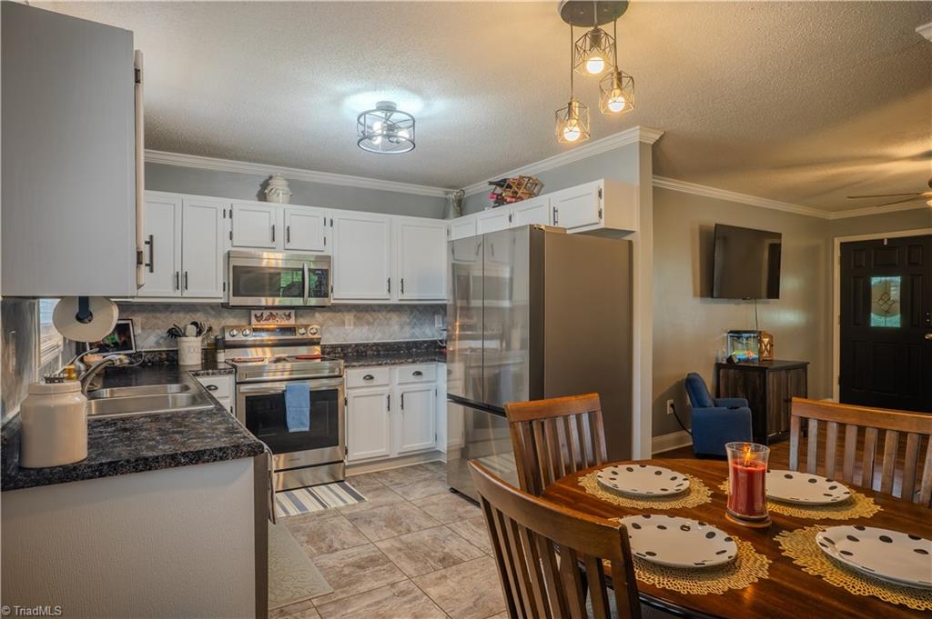 214 Fork Bixby Road Advance, NC 27006 - Photo 4 of 40 Kitchen/Dining
