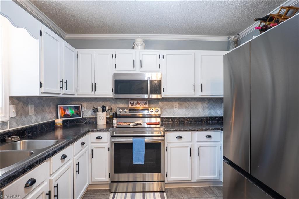 214 Fork Bixby Road Advance, NC 27006 - Photo 6 of 40 Stainless Steel Appliances